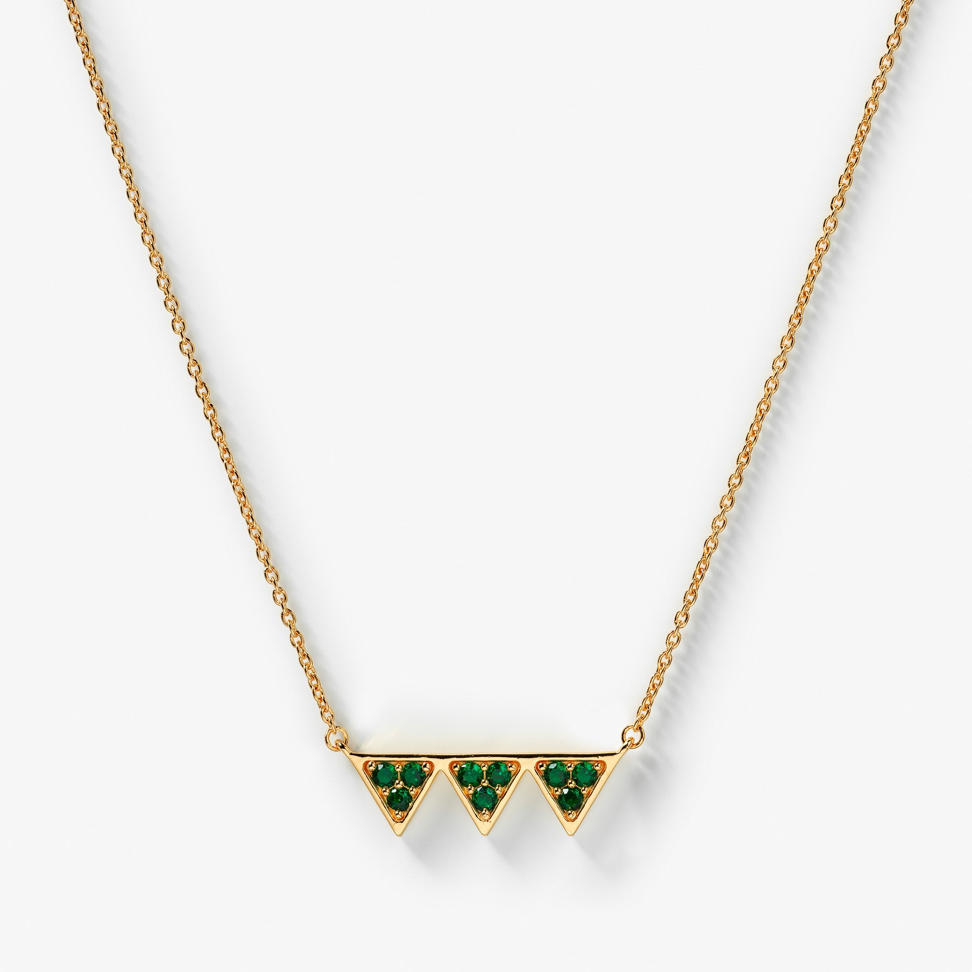 GetTheGallop_sharktooth_necklace_gold_green_stones_logo.jpg